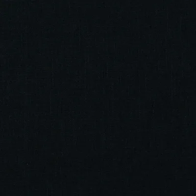 New York in Noir, a textured solid fabric in polyester. Ideal for drapery, pillows, bedding and light upholstery. Order samples at InteriorDecorating.com